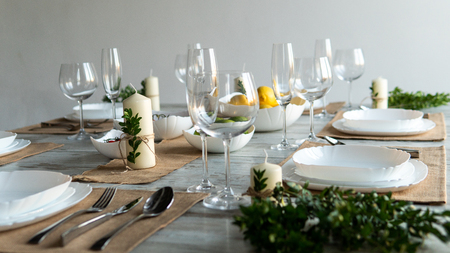 Beautiful table setting with lavender flowers on wooden background.