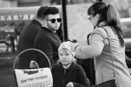 Full length of a smiling couple walking on sidewalk Lutsk Ukraine 20.04.2018.のeditorial素材