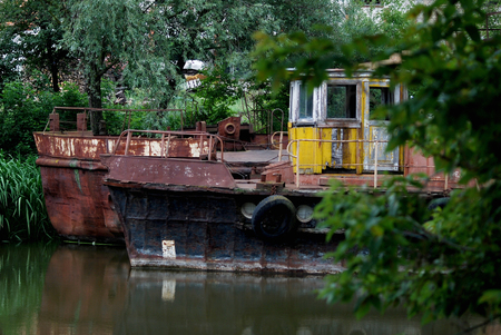 Old rusty barge and tugの写真素材