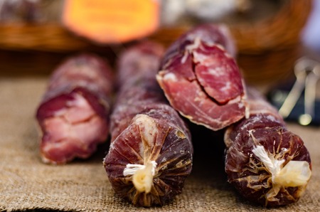 Assorted meat products including ham and sausagesの写真素材