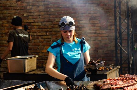 chefs working on grill Lutsk Ukraine 11-05-19