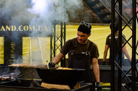 chefs working on grill Lutsk Ukraine 11-05-19のeditorial素材