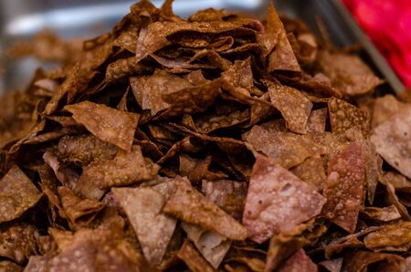 multicolored chips from potatoes background.の写真素材