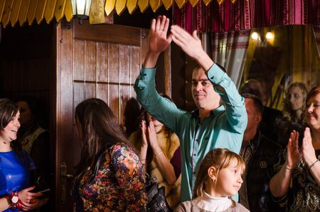 Bride and Groom at wedding Day walking Outdoors on spring nature. Bridal couple, Happy Newlywed woman and man embracing in green park. Loving wedding couple outdoor. 12.03.18 lutsk, Ukraine.のeditorial素材