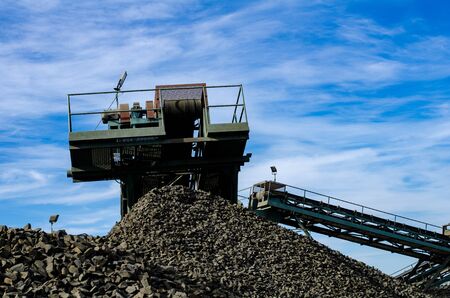 Mobile Stone crusher machine by the construction site or mining quarry for crushing old concrete...