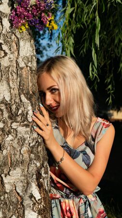 Beautiful sexy blonde woman, dress natureの写真素材