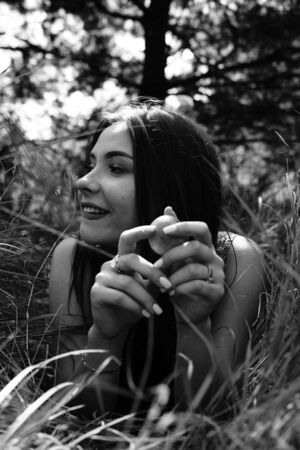Portrait of an young beautiful sexy woman on the nature.