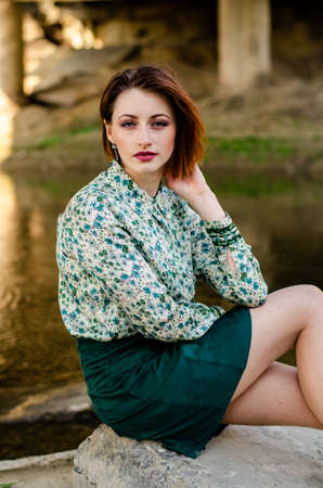 Sexy brunette woman posing in fashionable lingerie in jungle.の写真素材