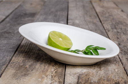 Beautiful table setting with lavender flowers on wooden backgroundの写真素材