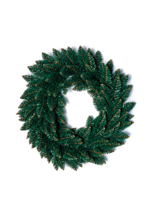 Green Christmas wreath from an artificial tree without decorations on a white isolate.の写真素材