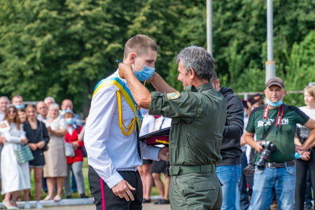 President Poroshenko of Ukraine together with military. The students of the Kiev military lyceum named after Ivan Bohun to take an oath of allegiance to Ukraine. Lutsk, UKRAINE - October, 14 2020:のeditorial素材