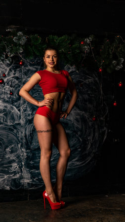 Woman in red underwear with lollipopの写真素材