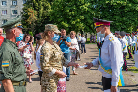 President Poroshenko of Ukraine together with military. The students of the Kiev military lyceum named after Ivan Bohun to take an oath of allegiance to Ukraine. Lutsk, UKRAINE - October, 14 2020のeditorial素材