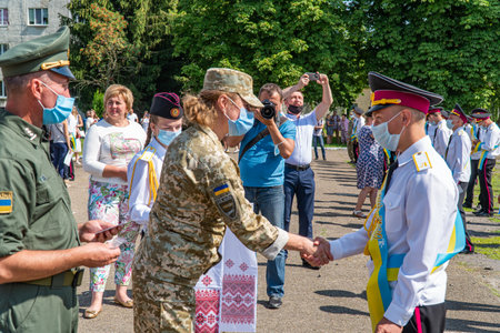 President Poroshenko of Ukraine together with military. The students of the Kiev military lyceum named after Ivan Bohun to take an oath of allegiance to Ukraine. Lutsk, UKRAINE - October, 14 2020のeditorial素材