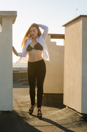 Young woman posing in the roof, Lifestyle portraitの写真素材