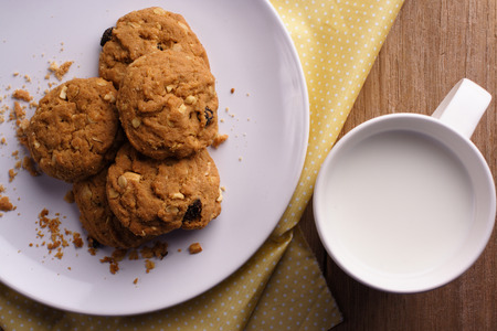 Cookie and milk on wooden backgroundの写真素材