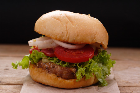 Hamburgers on wooden backgroundの写真素材
