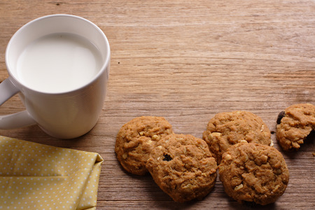 Cookie and milk on wooden backgroundの写真素材