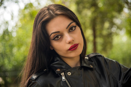 Young girl in trendy sensual clothing, outdoors in the streets of Naples