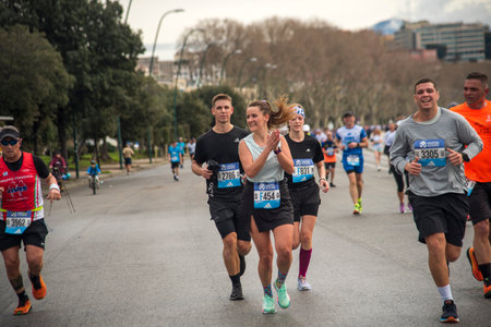 Naples half marathon, 25 February 2025, runners on the Caracciolo seafront.のeditorial素材