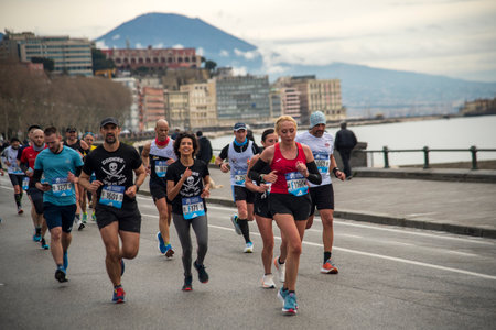 Naples half marathon, 25 February 2025, runners on the Caracciolo seafront.のeditorial素材