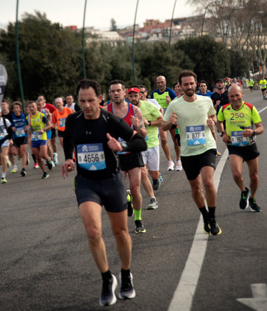 Naples half marathon, 25 February 2025, runners on the Caracciolo seafront.のeditorial素材
