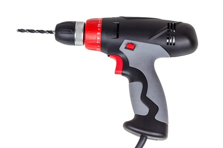 Black and red screwdriver drill isolated on a white backgroundの写真素材