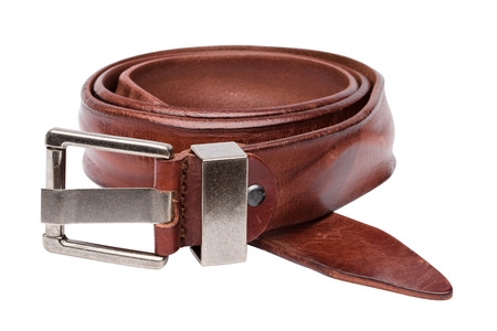 Brown men leather belt isolated on white backgroundの写真素材
