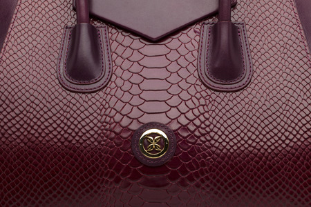 Brown natural leather female purse closeup