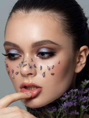 Portrait of beautiful woman with fashion makeupの写真素材