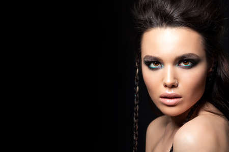 Portrait of beautiful woman with evening make u