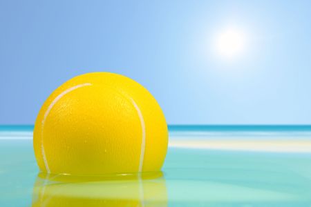 Ball floating in the seaの写真素材