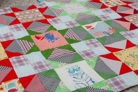 Patchwork, sewing with pieces of fabric, multi-colored segments.