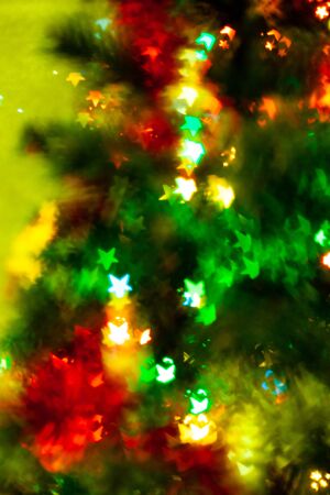 Blured sparks of light on cristmas tree, spruce lights on background