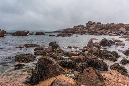 Perros Guirec, Ploumanac'h Lighthouse, Mean Ruz Lighthouse, la Manche,at winter, rocks and waves