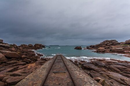 Perros Guirec, Ploumanac'h Lighthouse, Mean Ruz Lighthouse, la Manche,at winter, rocks and waves