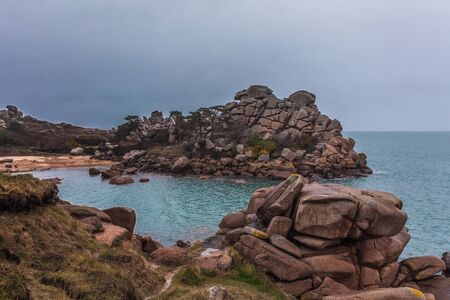 Perros Guirec, Ploumanac'h Lighthouse, Mean Ruz Lighthouse, la Manche,at winter, rocks and wavesの写真素材