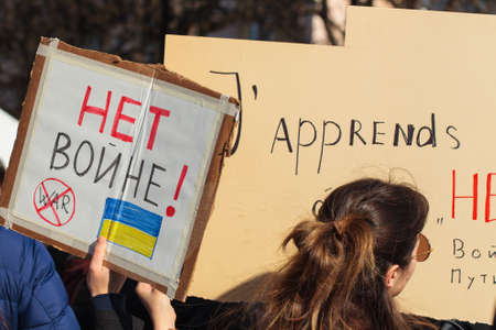 War in Ukraine support with poster, Strasbourg, France, Russian consulate February 2022のeditorial素材