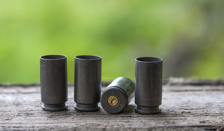 pistol sleeves on a wooden backgroundの写真素材