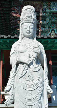 quan yin buddha scupture make by white stoneの写真素材