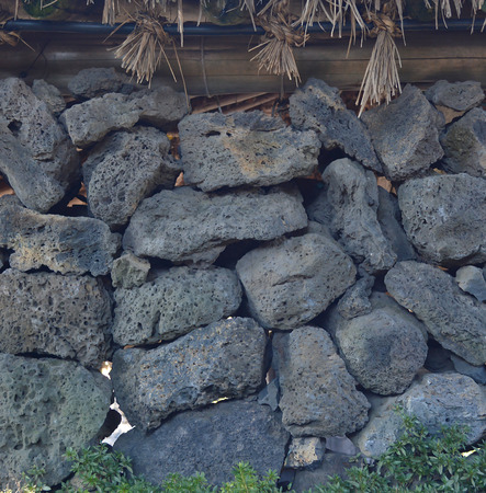 tile volcanic stone texture and background,wall in jeju island at koreaの写真素材