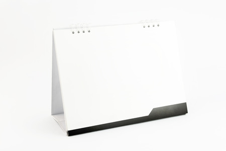 blank Desk Calendar isolated on whiteの写真素材