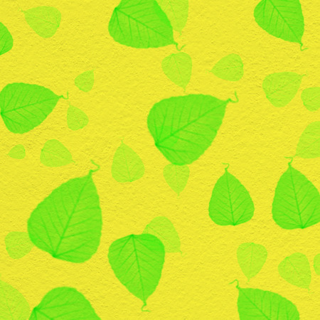 yellow wall texture with green leaf paint,for backgroundの写真素材