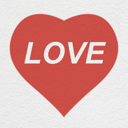 heart painting with love  text on the white wallの写真素材