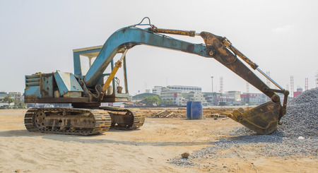 old backhoe dozer on site