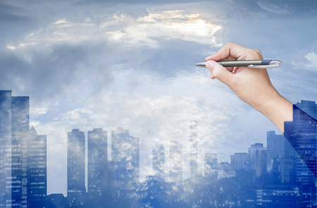 hand drawing on sky and city background,double exposure processの写真素材