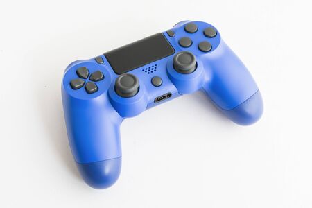 A joystick controller on the white isolated background, blue coloredの写真素材