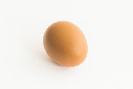 the single egg on the white isolated backgroundの写真素材
