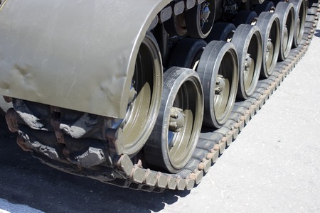 Tank close-up with wheel, caterpillar. Armored machine of America. American tank.の写真素材
