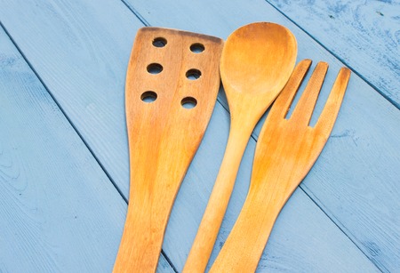 kitchen tools on a blue board closeup